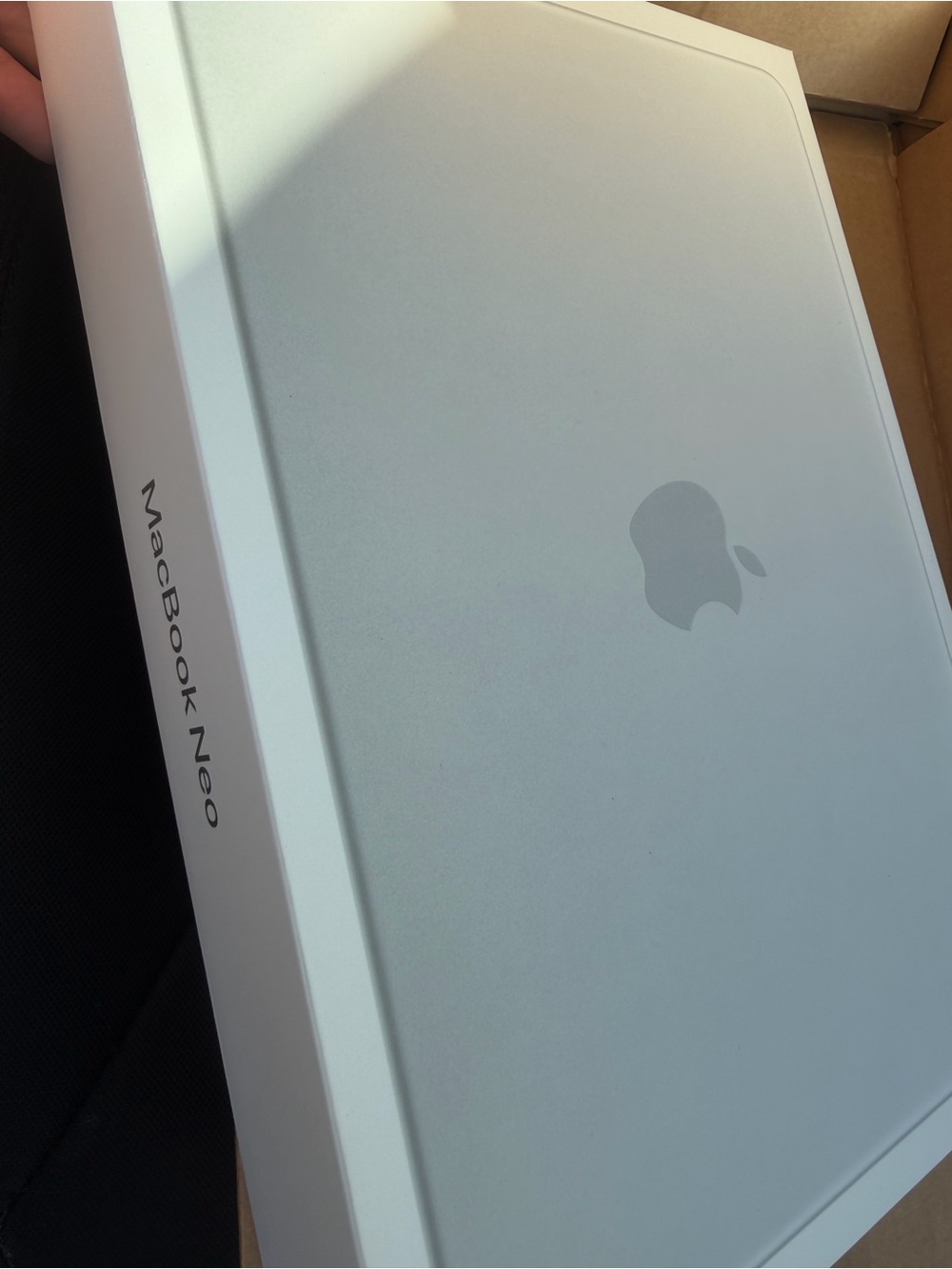 Apple MacBook Neo Silver Box with Apple Logo